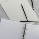 empty book page with pencil